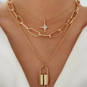 3 Strand lock/star pendant necklace